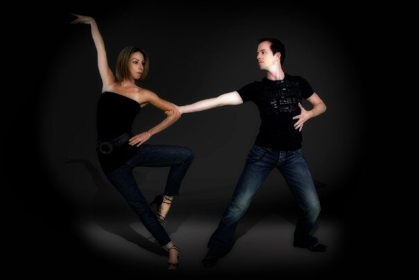Partners moving together in dance