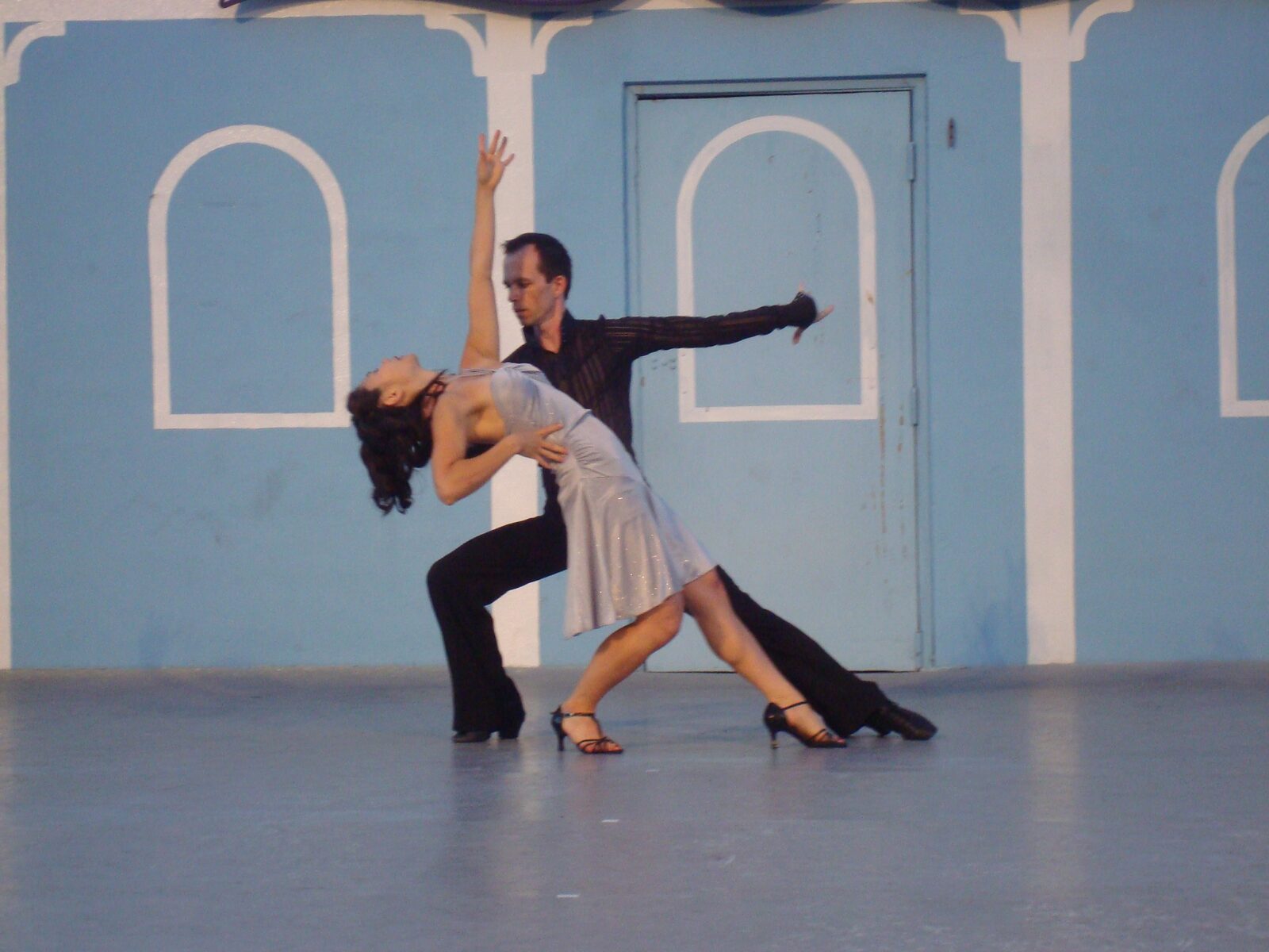 Dominic Boyer and a partner moving through choreography